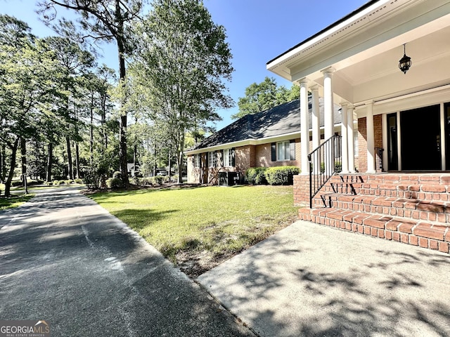 view of yard with a porch