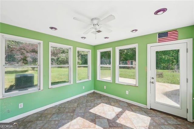 3880 Dial Mill Rd NE, Conyers, GA 30013 - unfurnished sunroom with baseboards