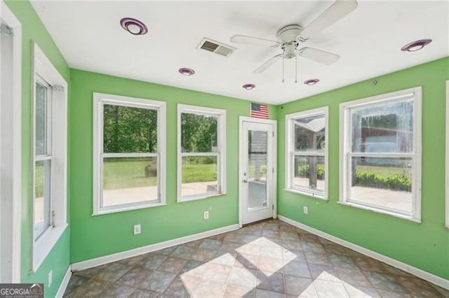 3880 Dial Mill Rd NE, Conyers, GA 30013 - unfurnished room featuring a ceiling fan, baseboards, and stone finish flooring