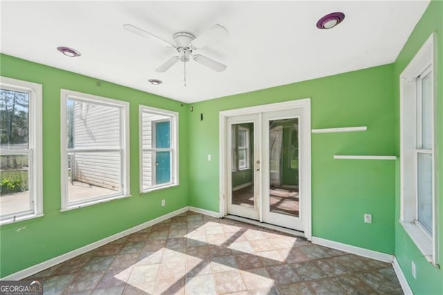 3880 Dial Mill Rd NE, Conyers, GA 30013 - unfurnished sunroom with healthy amount of natural light and french doors