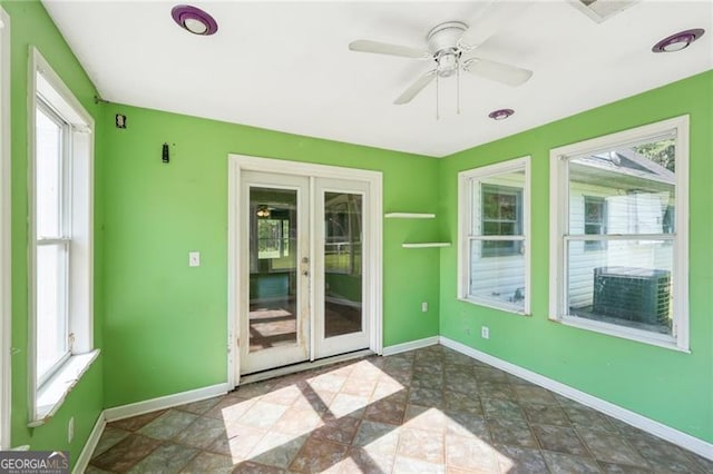 3880 Dial Mill Rd NE, Conyers, GA 30013 - unfurnished sunroom featuring french doors
