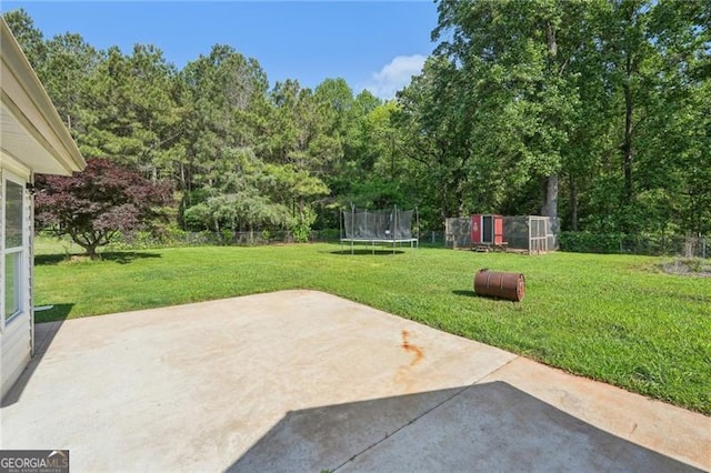 3880 Dial Mill Rd NE, Conyers, GA 30013 - view of patio / terrace featuring a trampoline