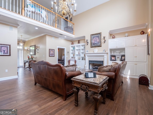living room with baseboards, dark wood-style floors, a fireplace, and a high ceiling