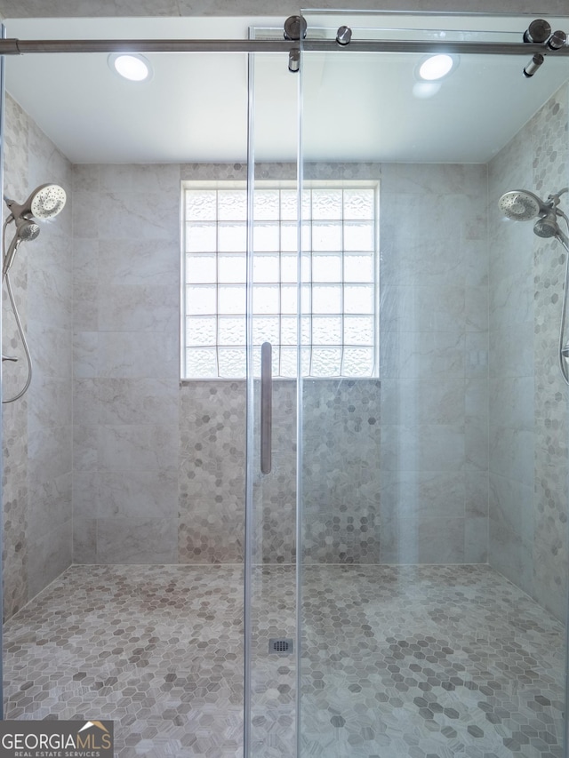 full bathroom featuring a stall shower and recessed lighting