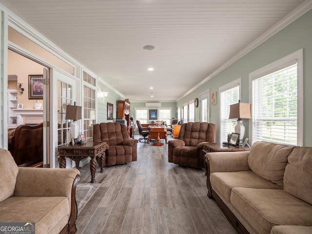 living area featuring crown molding, dark wood-type flooring, and recessed lighting