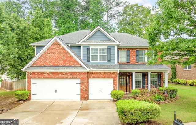 3016 Levinshire Way, Dacula, GA 30019 - view of front of property featuring a shingled roof, driveway, fence, and a front yard