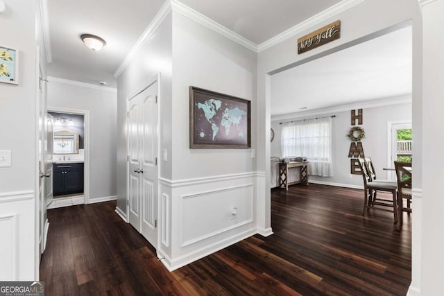 3016 Levinshire Way, Dacula, GA 30019 - hallway with dark wood-style flooring, baseboards, and ornamental molding
