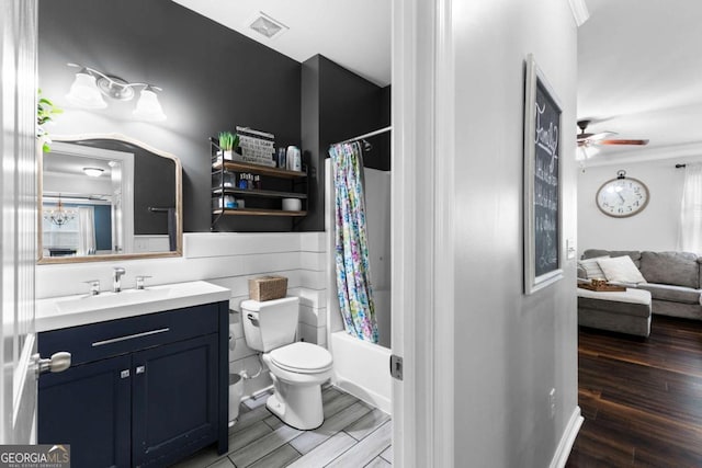 3016 Levinshire Way, Dacula, GA 30019 - full bath with a ceiling fan, toilet, wood finished floors, and vanity