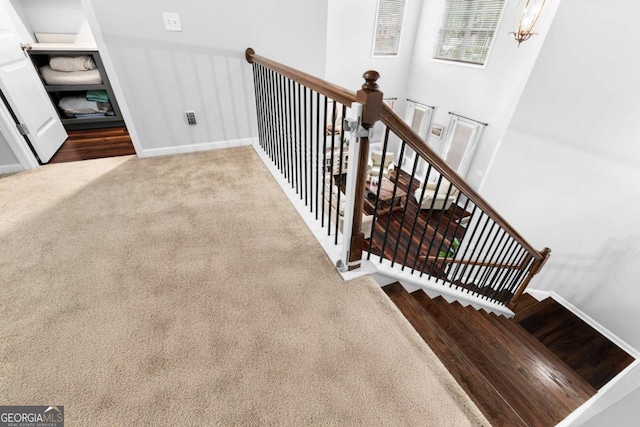 3016 Levinshire Way, Dacula, GA 30019 - staircase with carpet flooring and baseboards
