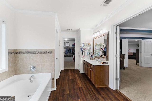 3016 Levinshire Way, Dacula, GA 30019 - ensuite bathroom featuring ensuite bath, visible vents, a bath, vanity, and crown molding