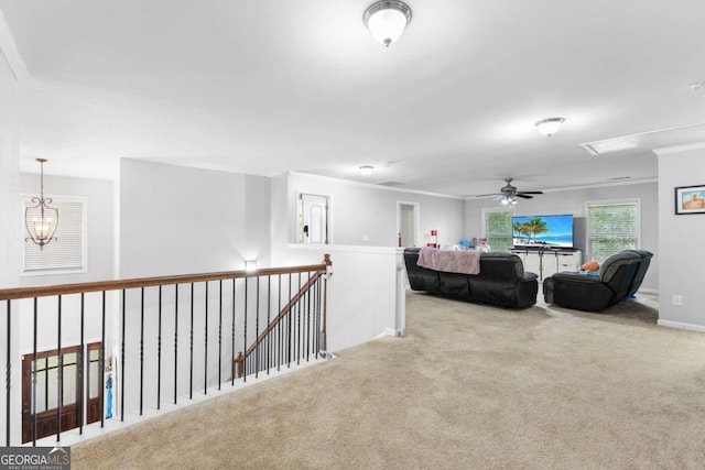 3016 Levinshire Way, Dacula, GA 30019 - interior space featuring baseboards, ceiling fan with notable chandelier, and carpet floors