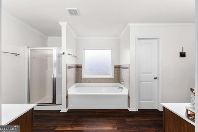 3016 Levinshire Way, Dacula, GA 30019 - full bath featuring vanity, visible vents, a bath, and wood finished floors