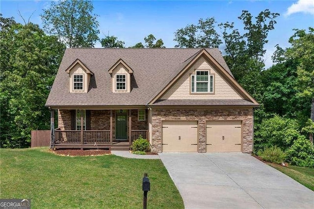 42 Treemont Dr SE, Cartersville, GA 30121 - view of front of property featuring a porch, a front lawn, driveway, and stone siding