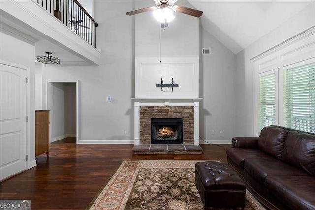 42 Treemont Dr SE, Cartersville, GA 30121 - living area with ceiling fan, high vaulted ceiling, wood finished floors, and a stone fireplace