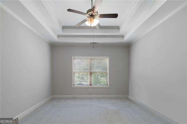 42 Treemont Dr SE, Cartersville, GA 30121 - carpeted spare room with crown molding, a raised ceiling, and a ceiling fan