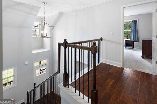 42 Treemont Dr SE, Cartersville, GA 30121 - stairway with a chandelier, hardwood / wood-style floors, and ornamental molding