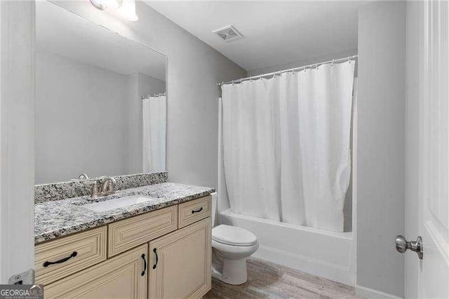 42 Treemont Dr SE, Cartersville, GA 30121 - full bathroom featuring vanity, wood finished floors, and shower / bath combination with curtain