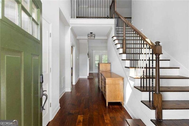 42 Treemont Dr SE, Cartersville, GA 30121 - foyer with hardwood / wood-style floors, stairway, a high ceiling, and crown molding