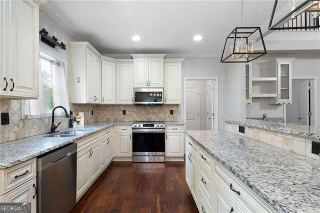 42 Treemont Dr SE, Cartersville, GA 30121 - kitchen featuring stainless steel appliances, light stone countertops, dark wood finished floors, open shelves, and white cabinetry