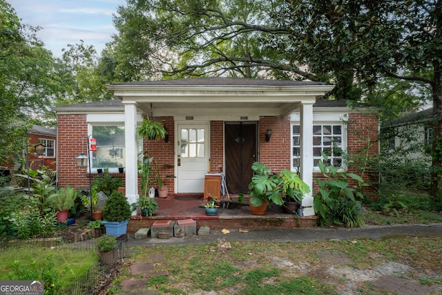 1336 Sharon St NW, Atlanta, GA 30314 - view of front of property with brick siding and covered porch