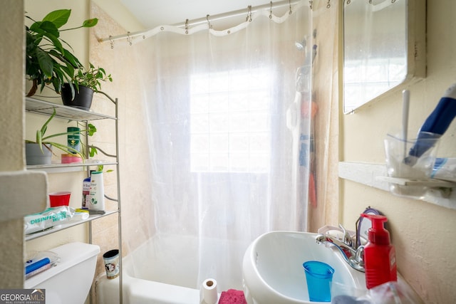 1336 Sharon St NW, Atlanta, GA 30314 - bathroom featuring toilet and shower / bath combination with curtain