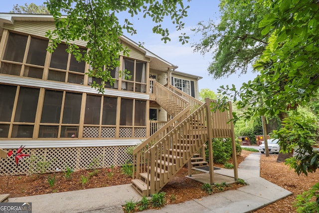 401 N Cromwell Rd Unit 6K, Savannah, GA 31410 - rear view of property with stairs and a sunroom