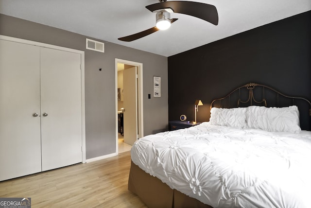 401 N Cromwell Rd Unit 6K, Savannah, GA 31410 - bedroom with a closet, baseboards, ceiling fan, visible vents, and wood finished floors