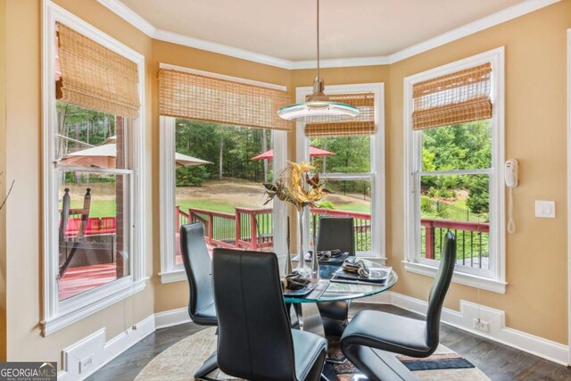 3364 Kylee Dawn Cir, Lawrenceville, GA 30045 - dining room featuring a wealth of natural light, ornamental molding, and dark wood finished floors