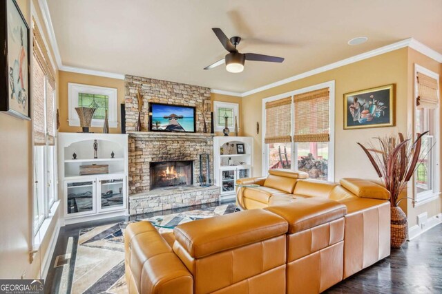 3364 Kylee Dawn Cir, Lawrenceville, GA 30045 - living room with a fireplace, ornamental molding, a ceiling fan, and a healthy amount of sunlight