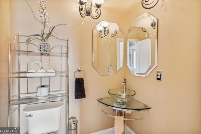 3364 Kylee Dawn Cir, Lawrenceville, GA 30045 - half bathroom featuring toilet and baseboards