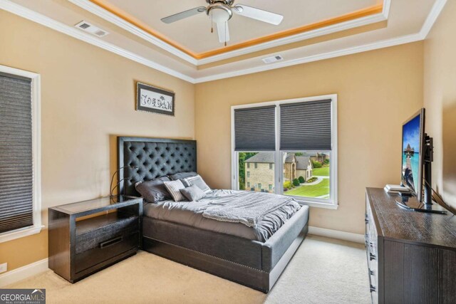 3364 Kylee Dawn Cir, Lawrenceville, GA 30045 - carpeted bedroom with ornamental molding, a raised ceiling, baseboards, and visible vents