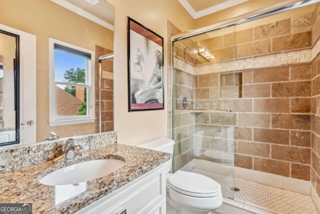 3364 Kylee Dawn Cir, Lawrenceville, GA 30045 - full bathroom featuring crown molding, toilet, a shower stall, and vanity