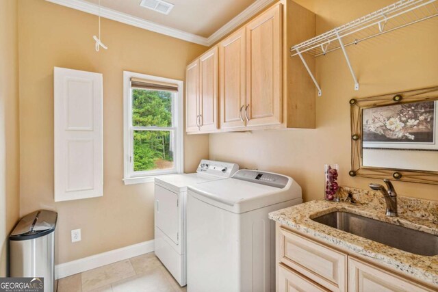 3364 Kylee Dawn Cir, Lawrenceville, GA 30045 - laundry room featuring independent washer and dryer, baseboards, visible vents, a sink, and cabinet space