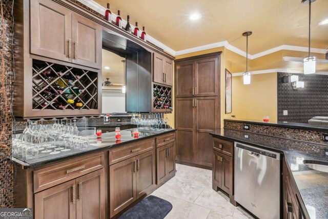 3364 Kylee Dawn Cir, Lawrenceville, GA 30045 - kitchen with tasteful backsplash, dark stone countertops, decorative light fixtures, crown molding, and stainless steel dishwasher