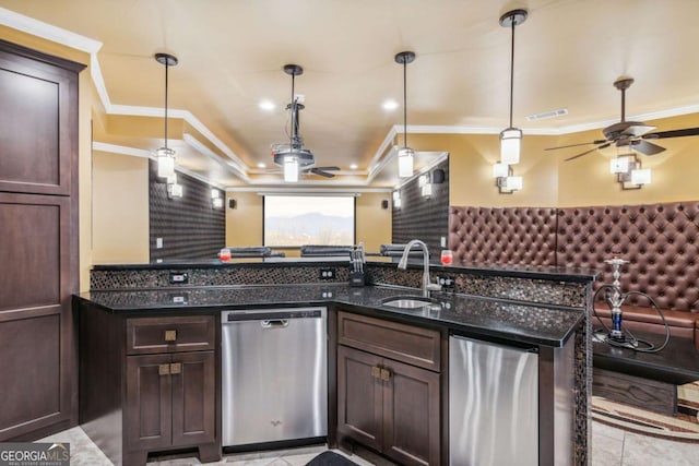 3364 Kylee Dawn Cir, Lawrenceville, GA 30045 - kitchen with stainless steel dishwasher, ceiling fan, ornamental molding, dark brown cabinetry, and refrigerator