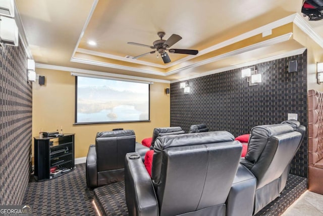 3364 Kylee Dawn Cir, Lawrenceville, GA 30045 - cinema room featuring ceiling fan, crown molding, a tray ceiling, and carpet floors