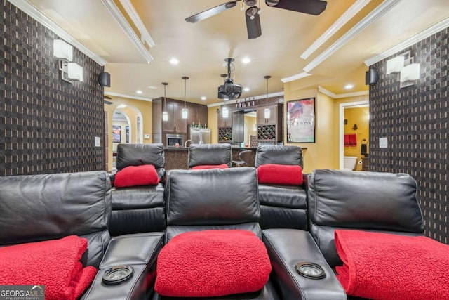 3364 Kylee Dawn Cir, Lawrenceville, GA 30045 - home theater room featuring ornamental molding, a ceiling fan, arched walkways, and recessed lighting