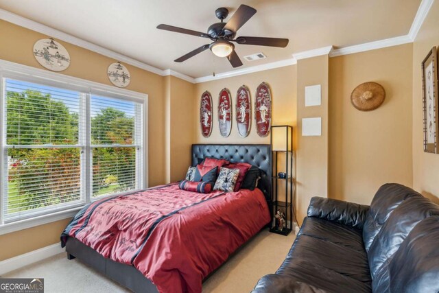 3364 Kylee Dawn Cir, Lawrenceville, GA 30045 - carpeted bedroom featuring crown molding, baseboards, ceiling fan, and visible vents