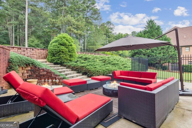 3364 Kylee Dawn Cir, Lawrenceville, GA 30045 - view of patio / terrace with an outdoor living space with a fire pit, fence, and stairs