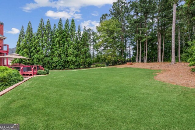3364 Kylee Dawn Cir, Lawrenceville, GA 30045 - view of yard featuring a wooden deck