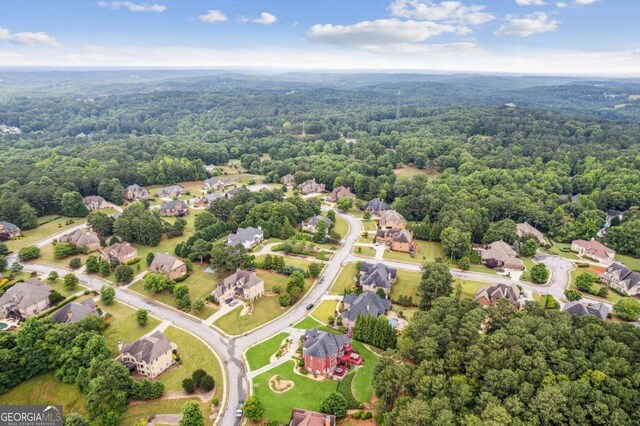 3364 Kylee Dawn Cir, Lawrenceville, GA 30045 - drone / aerial view featuring a forest view and a residential view