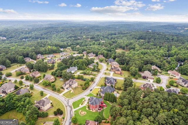 3364 Kylee Dawn Cir, Lawrenceville, GA 30045 - aerial perspective of suburban area with a forest
