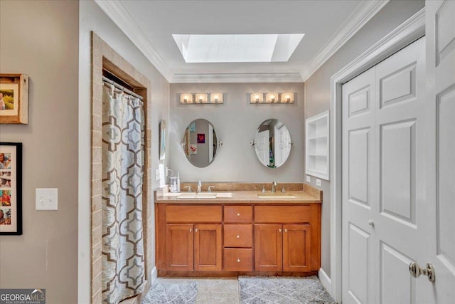 full bathroom featuring a sink, double vanity, a skylight, and crown molding