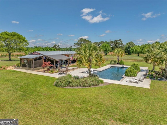 outdoor pool with a yard, a gazebo, and a patio