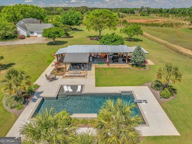 outdoor pool featuring a yard, a gazebo, a patio area, and outdoor dining space