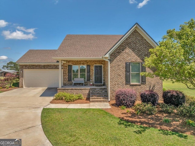 ranch-style house with driveway, brick siding, an attached garage, and a front yard