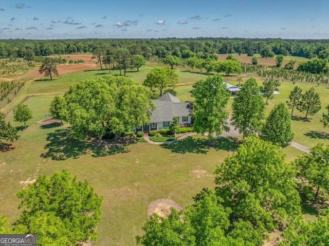 birds eye view of property with a rural view