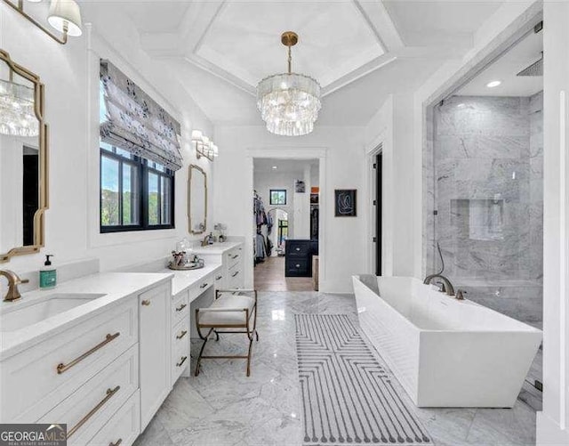bathroom featuring vanity, marble finish floor, a freestanding tub, coffered ceiling, and a notable chandelier