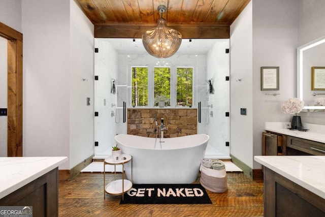 51 Birdseye Vw, Blue Ridge, GA 30513 - full bathroom featuring a stall shower, a soaking tub, baseboards, and wooden ceiling