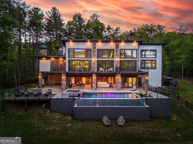 51 Birdseye Vw, Blue Ridge, GA 30513 - rear view of property with stone siding, a balcony, a yard, a chimney, and outdoor lounge area